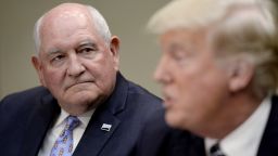 WASHINGTON, D.C. - APRIL 25: (AFP-OUT) Agriculture Secretary Sonny Perdue listens as US President Donald speaks during a roundtable with farmers in the Roosevelt Room of the White House on April 25, 2017 in Washington, DC. During the meeting Trump signed the Executive Order Promoting Agriculture and Rural Prosperity in America. (Photo by Olivier Douliery/Pool/Getty Images)