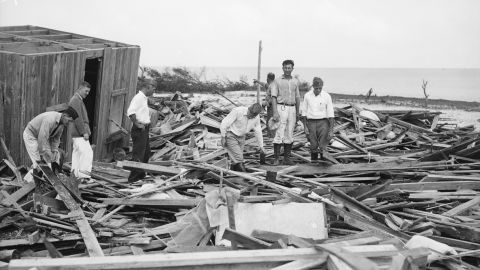 Rescue workers search for  victims of the Labor Day Storm in 1935. 