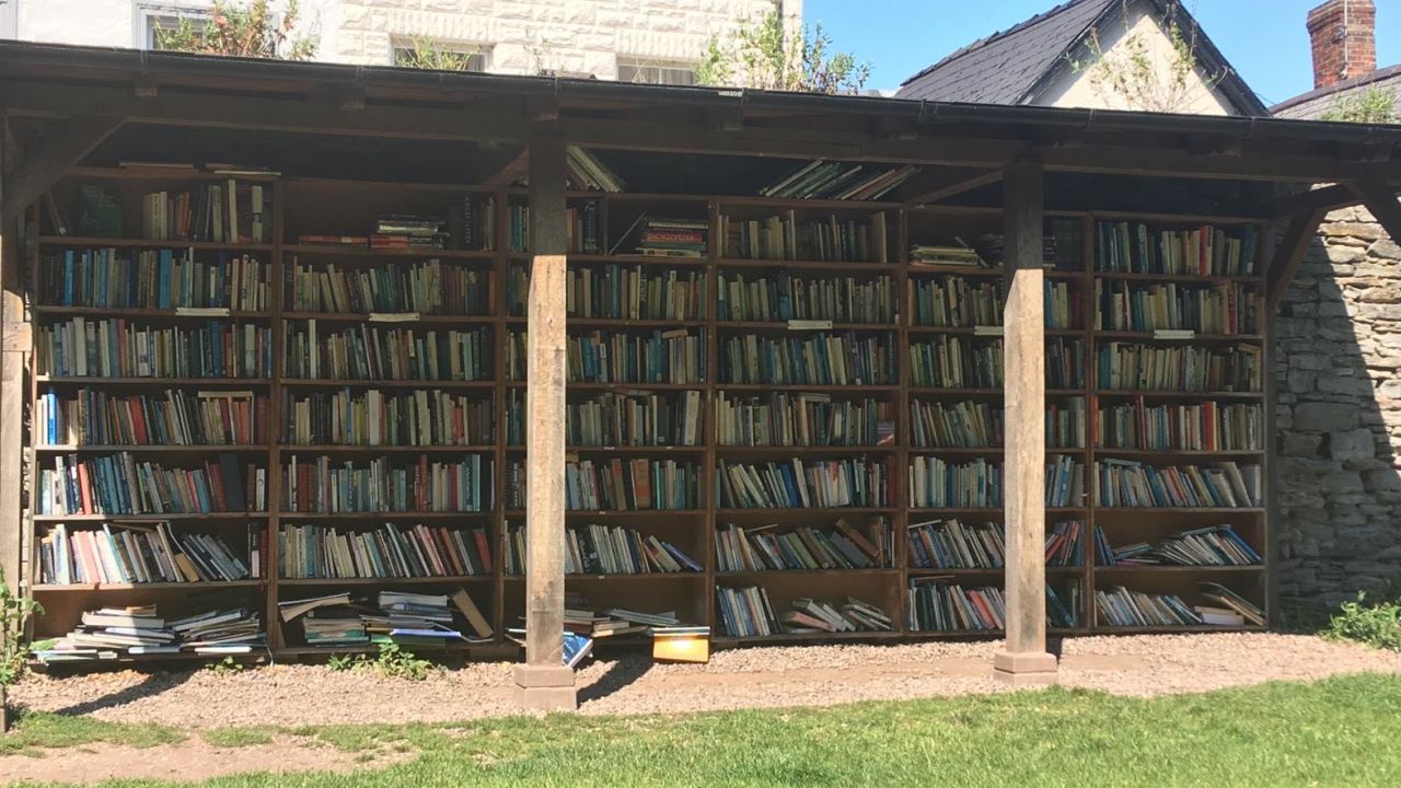Books are on display everywhere in Hay. At this "honesty bookshop" there are hundreds of books, all being sold for £1 (around $1.20).