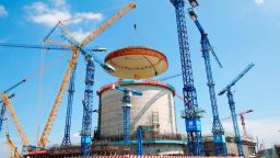 FANGCHENG, CHINA - MAY 23:  The dome is hoisted onto the reactor building at the construction site of the Fangchenggang Nuclear Power Plant Unit 3 on May 23, 2018 in Fangcheng, China. The nuclear reactor will be put into service in 2022.  (Photo by Visual China Group via Getty Images/Visual China Group via Getty Images)