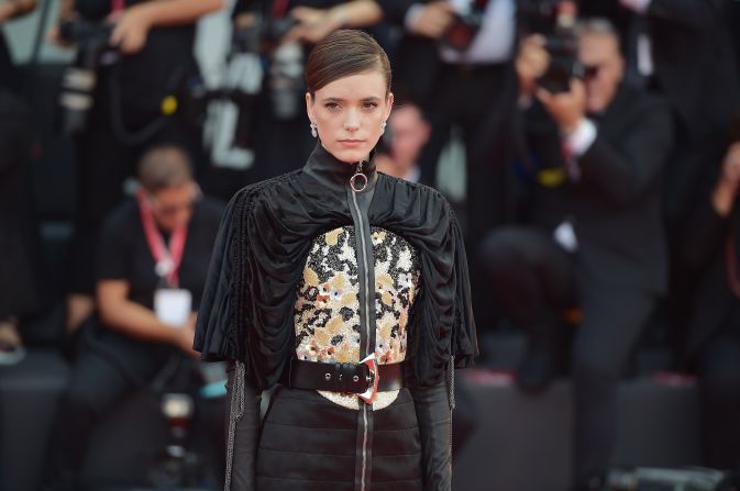 Jury member Stacy Martin covers up in a somber black number from Louis Vuitton's Resort 2020.