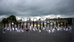 TUAM, IRELAND - AUGUST 26: A vigil takes place at the site of the mass grave which contained the remains of 796 named babies from the Bon Secours Mother and Baby home on August 26, 2018 in Tuam, Ireland. The vigil coincides with the Phoenix park mass which is taking place in Dublin held by Pope Francis. Excavations at the site in 2017 revealed underground structures which held babies bodies with ages ranging from 35 weeks to three years old with most of the dead buried in the 1950s when the facility was run by the Bon Secours Sisters, a Catholic religious order of nuns who received unmarried pregnant women to give birth. Pope Francis is the 266th Catholic Pope and current sovereign of the Vatican. His visit, the first by a Pope since John Paul II's in 1979, has attracted thousands of Catholics to a series of events in Dublin and Knock. During his visit he held private meetings with victims of sexual abuse by Catholic clergy. (Photo by Charles McQuillan/Getty Images)