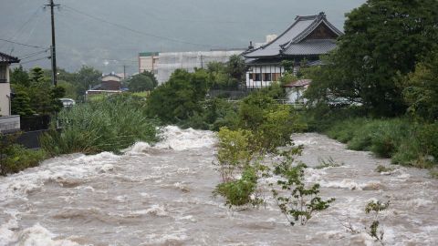 Rising water caused by heavy rain is seen at Muromi river in Fukuoka on August 28, 2019. 
