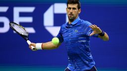 NEW YORK, NEW YORK - AUGUST 28: Novak Djokovic of Serbia returns a shot during his Men's Singles second round match against Juan Ignacio Londero of Argentina on day three of the 2019 US Open at the USTA Billie Jean King National Tennis Center on August 28, 2019 in the Flushing neighborhood of the Queens borough of New York City.  (Photo by Clive Brunskill/Getty Images)