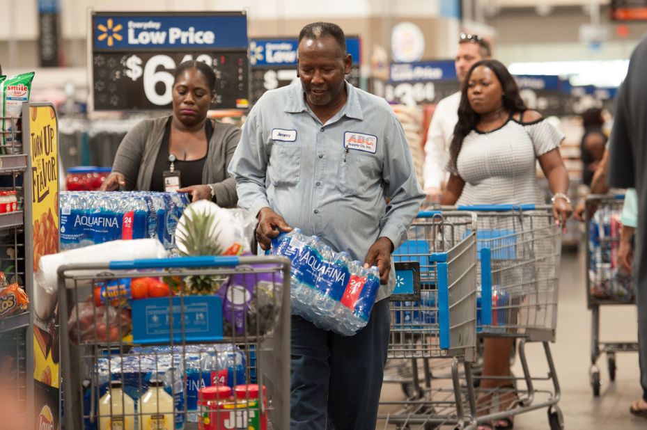 People stock up with groceries and water in Fort Lauderdale.
