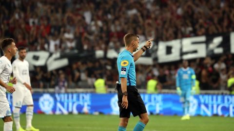 French referee Clement Turpin halts the game in Nice Wednesday.