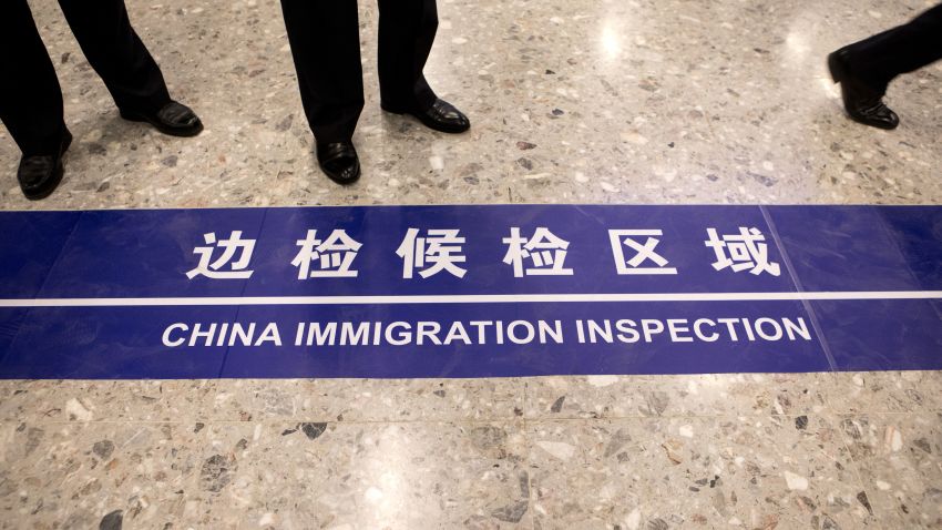 A sign reading "China Immigration Inspection" is displayed on the ground at the West Kowloon Station in Hong Kong on September 22, 2018. - The new rail link between Hong Kong and southern China will see joint immigration checkpoints at the West Kowloon terminus, in the heart of the city, with a special port area patrolled by mainland security and subject to Chinese law. (Photo by Giulia Marchi / POOL / AFP)        (Photo credit should read GIULIA MARCHI/AFP/Getty Images)