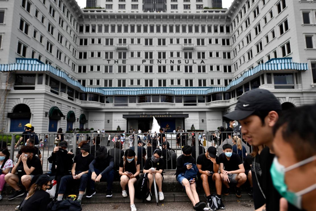 Protesters gathering in front of The Peninsula in Hong Kong. The hotel declined to comment on whether its business had been affected by a recent slowdown in the hospitality industry.