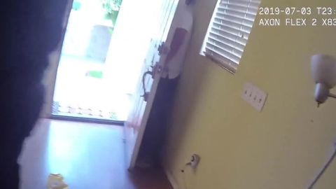 Li Xi Wang was hiding behind a door when a police officer shot him.
