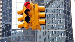 (GERMANY OUT) USA - New York City: Manhattan, red traffic light in front of the Broad Financial Center in the Financial District (Photo by JOKER/Walter G. Allgöwer/ullstein bild via Getty Images)