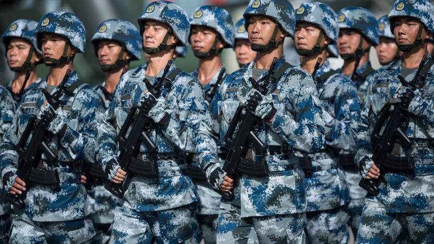 People's Liberation Army soldiers prepare for the arrival of China's President Xi Jinping at the Shek Kong barracks in Hong Kong on June 30, 2017. 
Xi arrived in Hong Kong on June 29 for a three-day visit to mark the 20th anniversary of the city's handover from British to Chinese rule and to inaugurate new chief executive Carrie Lam on July 1. / AFP PHOTO / DALE DE LA REY        (Photo credit should read DALE DE LA REY/AFP/Getty Images)