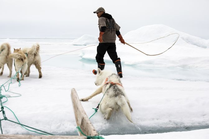 Jorgen Umaq and his dogs traverse an icy area near Qaanaaq in northern Greenland. It is one of the northernmost towns in the world. Because ice thickness there has been declining, hunters like Umaq can't travel as far as they could before, said photographer <a href="index.php?page=&url=https%3A%2F%2Fwww.anfilip.com%2F" target="_blank" target="_blank">Anna Filipova.</a> "Navigating this terrain was dangerous and difficult," she said. "We needed to manually move the sledge and twice needed to rescue the dogs who had fallen into the cracks in the sea. ... Each year, people lose their lives on the sea ice because of fast-changing conditions."