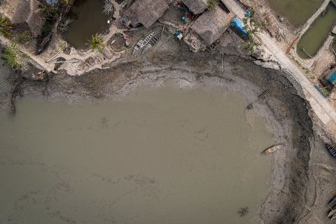 Bangladesh was recently ranked by research firm Maplecroft as the country <a href="https://www.cnn.com/2013/10/29/world/gallery/climate-change-index/index.html" target="_blank">most vulnerable to climate change,</a> due to its exposure to threats such as flooding, rising sea levels, cyclones and landslides as well as its susceptible population and weak institutional capacity to address the problem. This aerial photo, taken by <a href="http://www.ignacio-marin.com/" target="_blank" target="_blank">Ignacio Marin,</a> shows where some homes used to be before the river washed them away. "From where I was standing, at the riverbank, it was hard to imagine that there were nine houses where I could only see water," Marin said. "So I decided to fly the drone. Only then, watching the area from above, I realized the scale of the disaster."