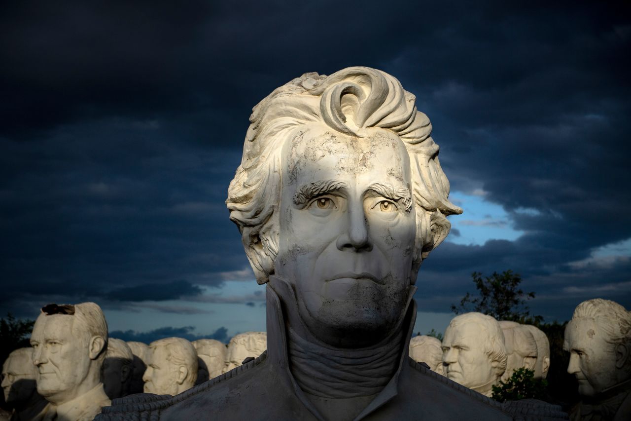 Sunshine illuminates a massive bust of former US President Andrew Jackson on Howard Hankins' property in Croaker, Virginia, on August 25. The sculpture of Jackson and other former presidents used to be part of the Presidents Park, a tourist attraction that closed in 2010.