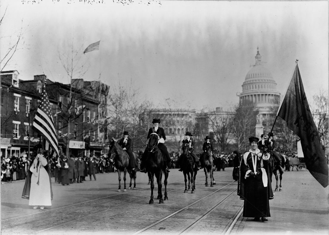 Women suffragists marching on Pennsylvania Avenue in 1913