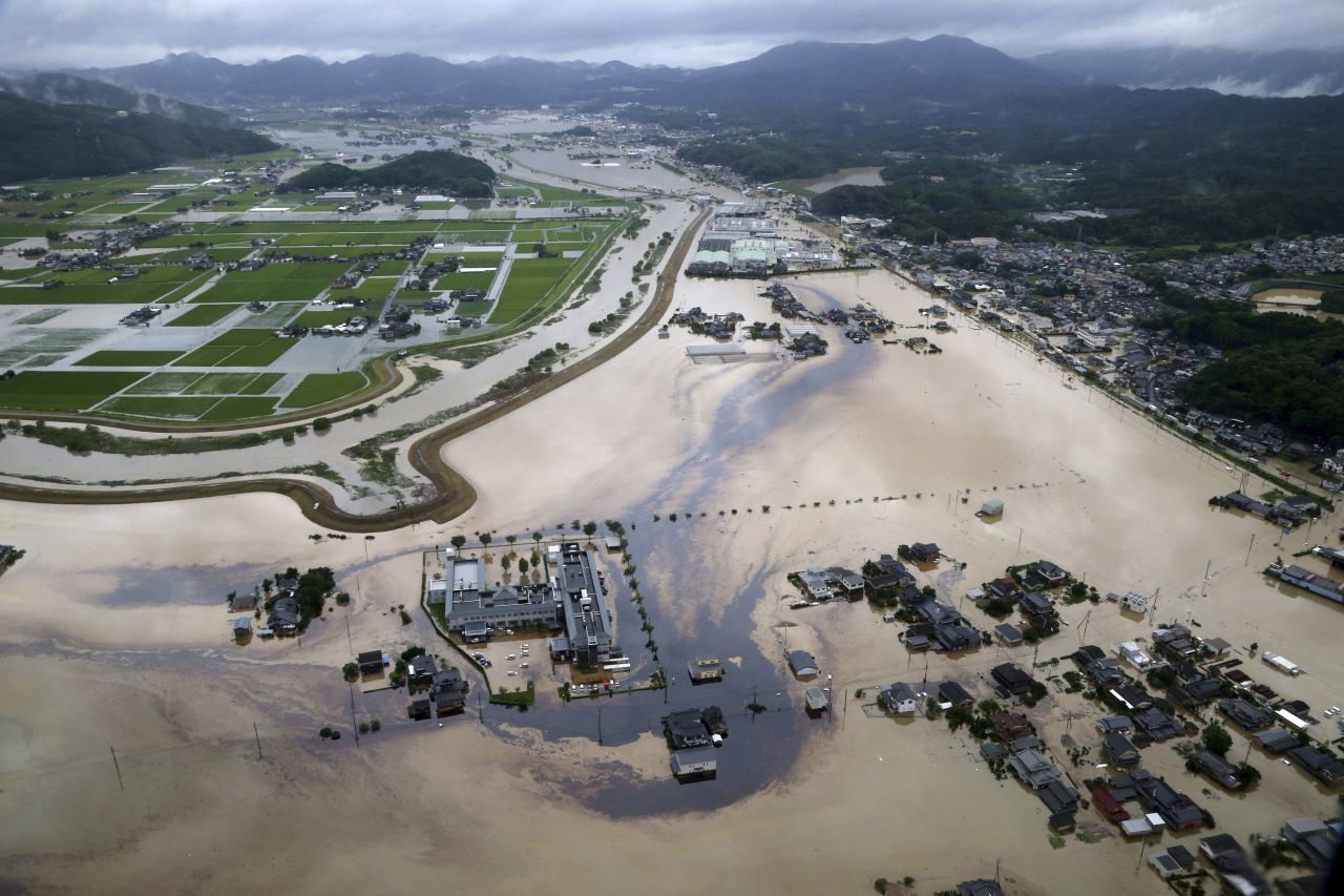 Oil spills from flooded tanks at an iron works factory in Omachi, Saga, Japan, on August 28. Hundreds of thousands of people were ordered to evacuate on Wednesday after <a href="https://www.cnn.com/2019/08/28/asia/japan-flooding-evacuation-intl/index.html" target="_blank">record-setting rainfall</a> started flooding southwestern Japan.
