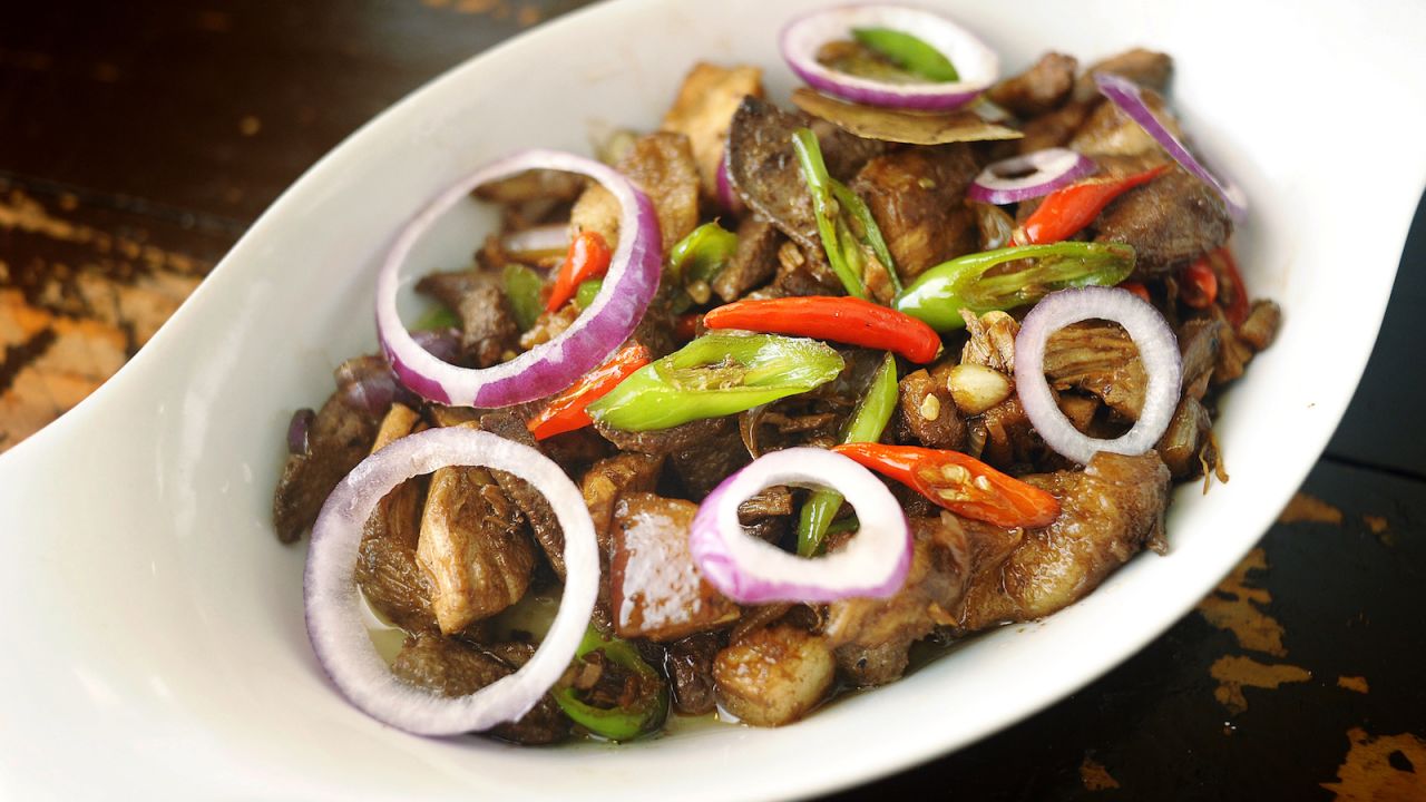 <strong>Igado: </strong>Pork belly and liver cooked in vinegar, soy sauce, garlic, onion, bay leaves, bell peppers and green peas make up igado, a popular dish in the Ilocos region of the Philippines as well as Bicol, in Albay province. Find it in Manila at Top Meal Food Haus. 