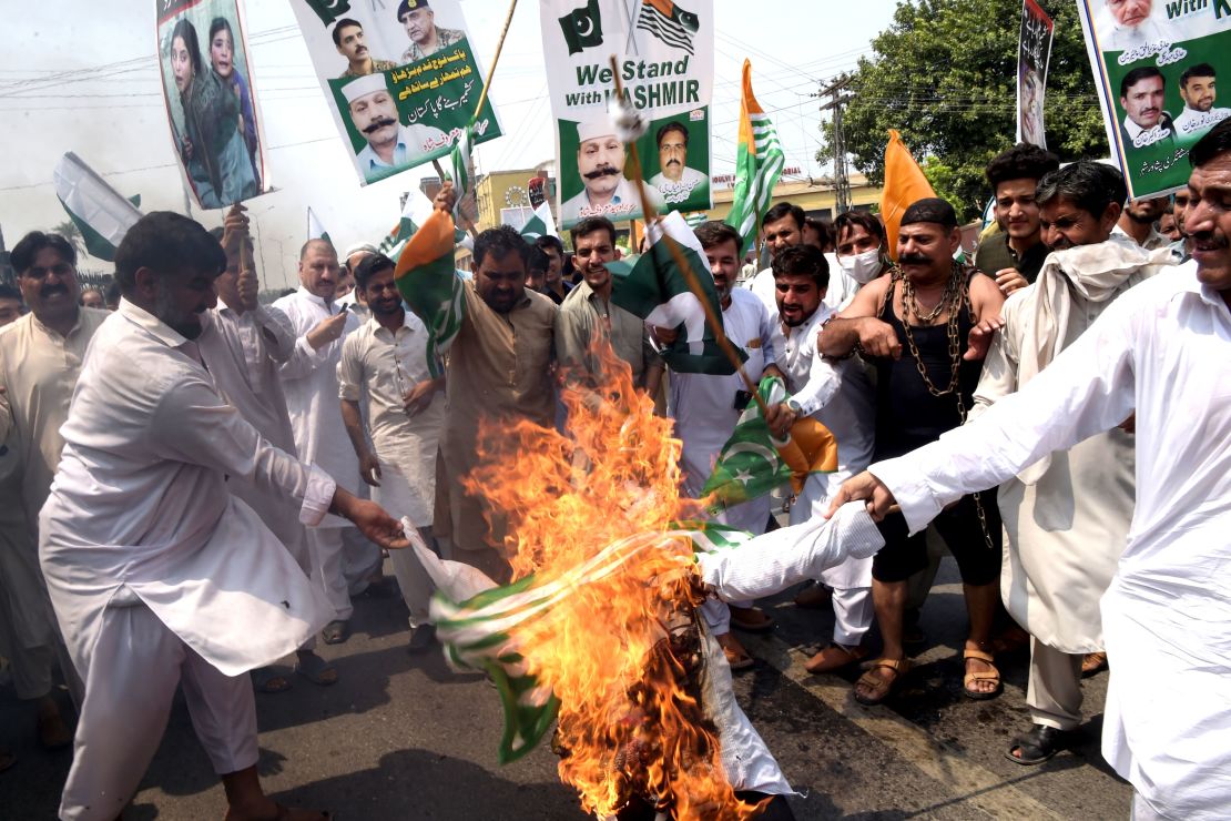 Pakistani demonstrators burn an effigy of Indian Prime Minister Narendra Modi during an anti-India protest rally in Peshawar.