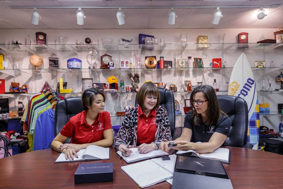 Because of the trade war, CEO Sharon Evans [center] is  looking for suppliers outside of China.