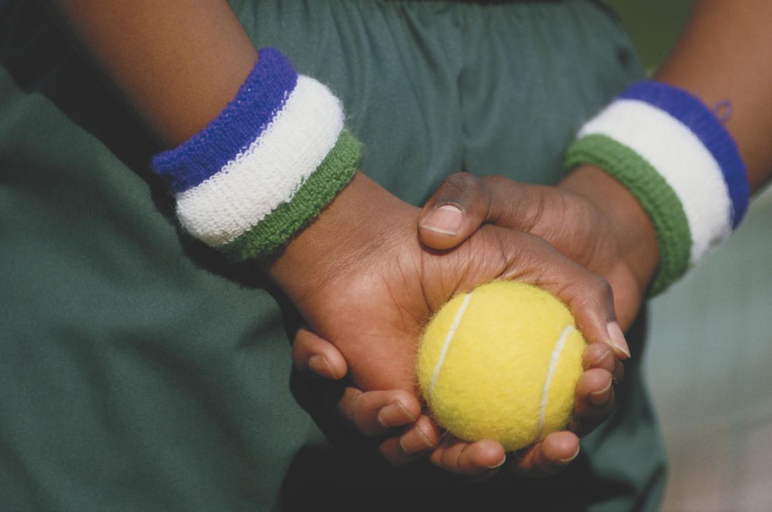 A ballboy holds a tennis ball in preparation during the Wimbledon Lawn Tennis Championships in London, England in 1987. 