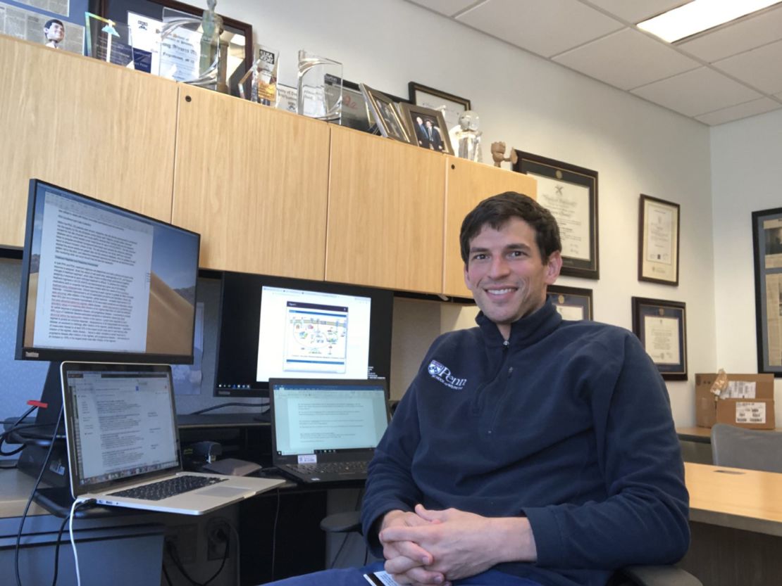 A recent photo of Fajgenbaum in his office at the University of Pennsylvania.