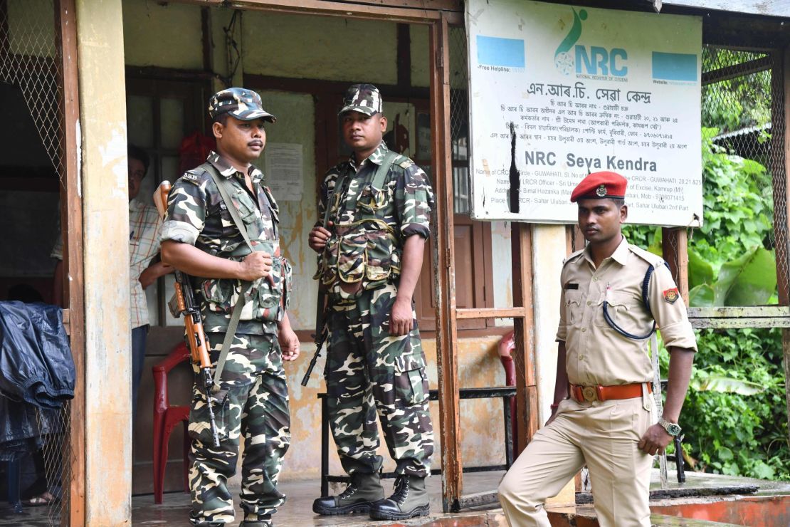 In this photo taken on August 28, 2019, security personnel stand guard at a National Register of Citizens (NRC) office ahead of the release of the register's final draft in Guwahati, the capital city of India's northeastern state of Assam.