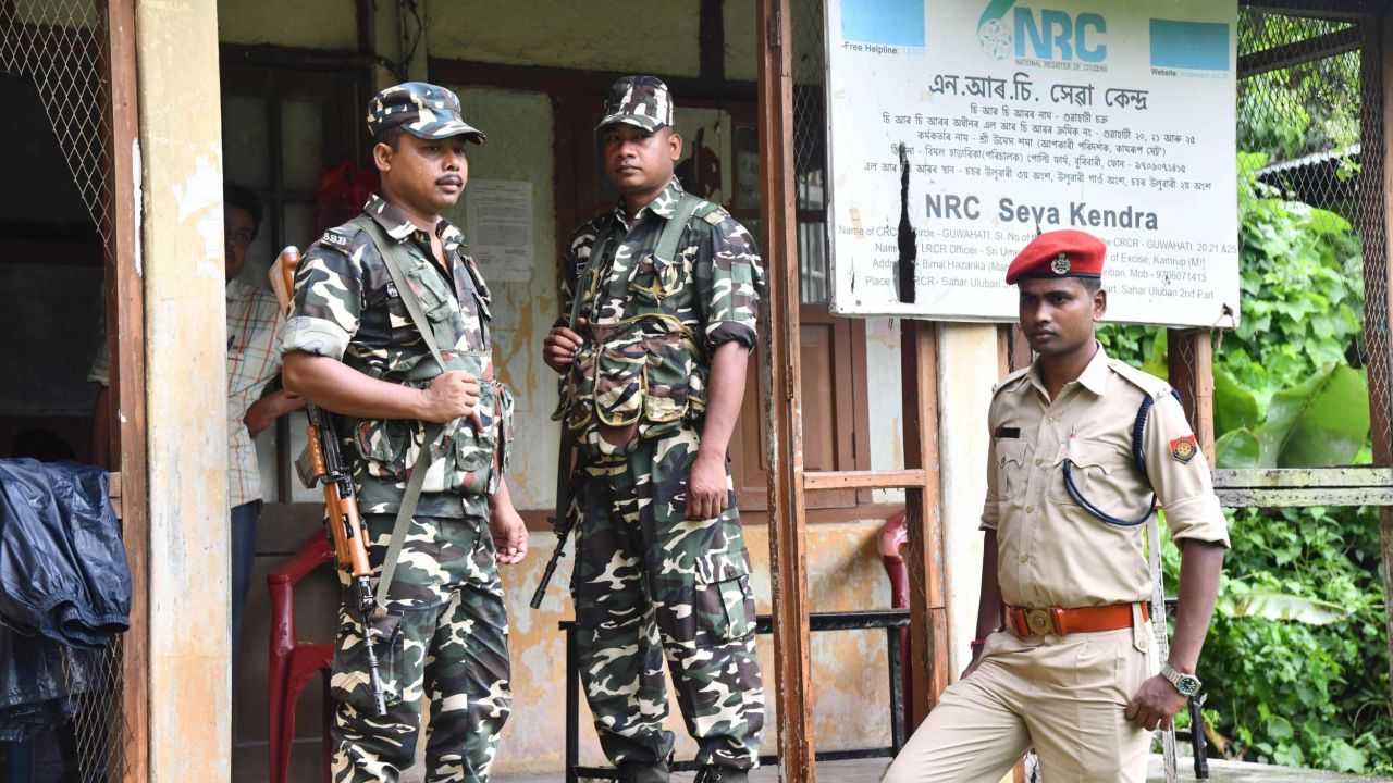 In this photo taken on August 28, 2019, security personnel stand guard at a National Register of Citizens (NRC) office ahead of the release of the register's final draft in Guwahati, the capital city of India's northeastern state of Assam.