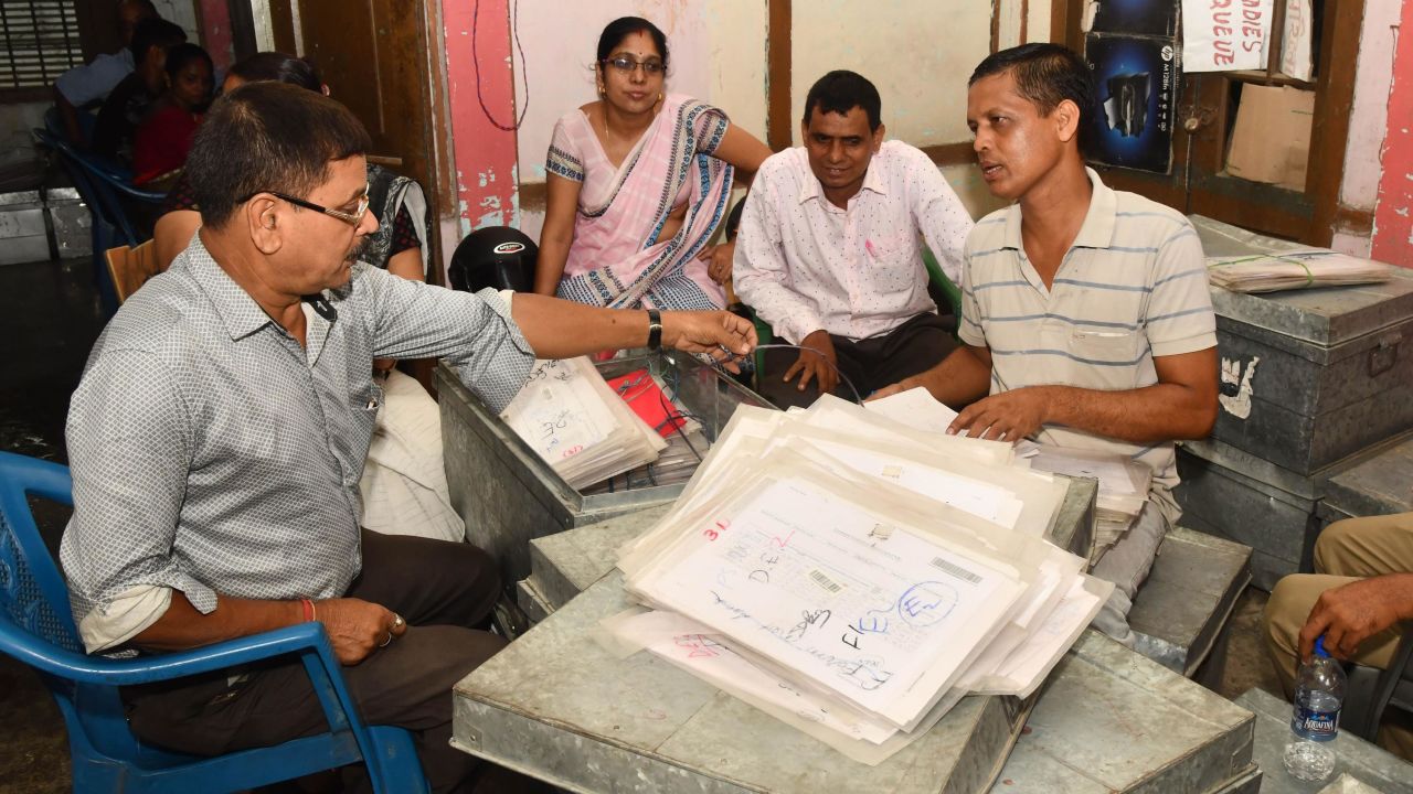 In this photo taken on August 28, 2019, workers at the National Register of Citizens (NRC) office check documents submitted by people for the NRC ahead of the release of the register's final draft in Guwahati, the capital city of Indias northeastern state of Assam. - India's government sought August 29 to ease concerns about an imminent "citizens' register" in the state of Assam that has left several million people, mostly Muslims, fearful of becoming stateless. (Photo by Biju BORO / AFP)        (Photo credit should read BIJU BORO/AFP/Getty Images)