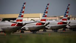 American Airlines Group Inc. Boeing Co. 737 Max planes sit parked outside of a maintenance hangar at Tulsa International Airport (TUL) in Tulsa, Oklahoma, U.S., on Tuesday, May 14, 2019. Three unions representing aviation safety inspectors said in a sharply worded report months before the Boeing's 737 Max was approved for use that the planemaker was given too much authority to oversee itself and that the new jet had safety flaws. Photographer: Patrick T. Fallon/Bloomberg via Getty Images