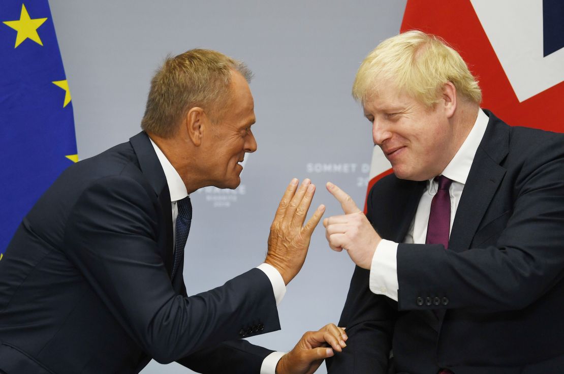 Boris Johnson  meets European Council President Donald Tusk at the G7 summit last month in Biarritz, France.