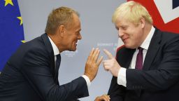 BIARRITZ, FRANCE - AUGUST 25: Britain's Prime Minister Boris Johnson (R) meets European Union Council President Donald Tusk (L) at a bilateral meeting during the G7 summit on August 25, 2019 in Biarritz, France. The French southwestern seaside resort of Biarritz is hosting the 45th G7 summit from August 24 to 26. High on the agenda will be the climate emergency, the US-China trade war, Britain's departure from the EU, and emergency talks on the Amazon wildfire crisis. (Photo by Neil Hall - Pool/Getty Images)