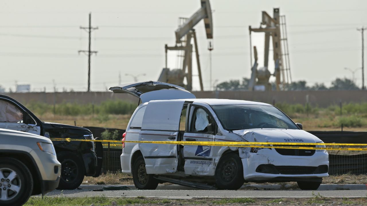 The shooter hijacked a US Postal Service vehicle, police said.