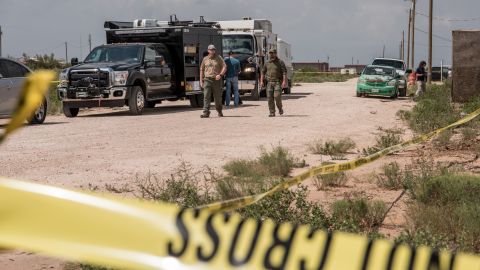 FBI agents search a home believed to be linked to a suspect following a deadly shooting spree on September 1, 2019 in West Odessa, Texas.