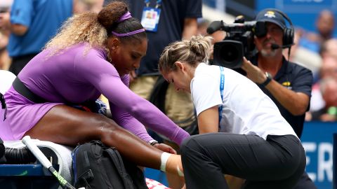 Serena Williams receives a medical timeout at the US Open Sunday for an ankle injury. 