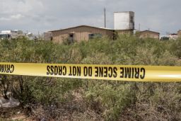 FBI agents search a home believed to be linked to Ator in West Odessa, Texas.  