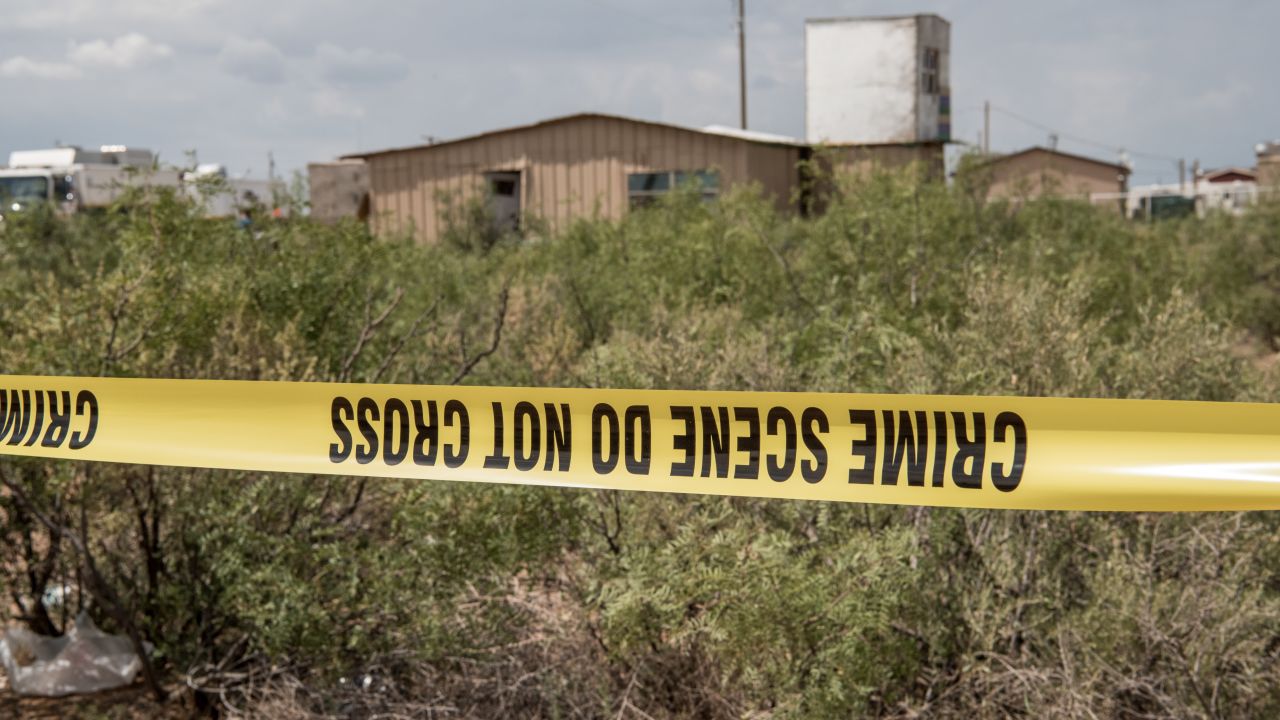 FBI agents search a home believed to be linked to Ator in West Odessa, Texas.  