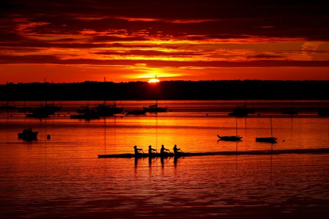 A quad scull of rowers train on Casco Bay in Portland, Maine, on Wednesday, August 28.