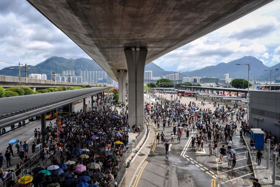 Protesters gather in the bus terminal at Hong Kong International Airport on Sunday, September 1. Hundreds of pro-democracy activists attempted to block transport routes to the city's airport.