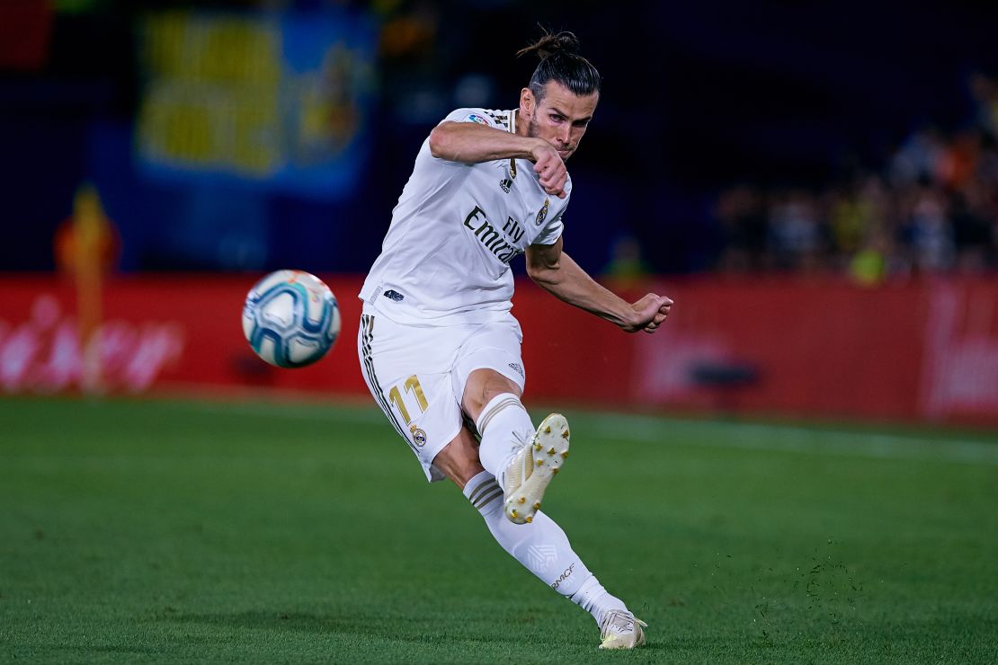 Gareth Bale takes aim against Villareal. His two goals helped Real Madrid earn a draw. 