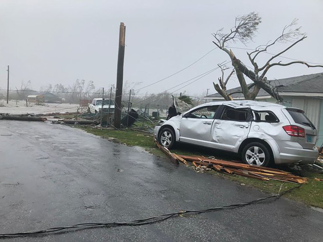 A damaged car sits amid the damage in Marsh Harbour, Bahamas.