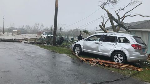A damaged car sits amid the damage in Marsh Harbour, Bahamas.