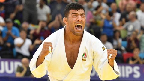 Mollaei celebrates after winning the men under 81kg category at the 2018 Judo World Championships.