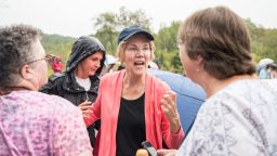 HAMPTON FALLS, NH - SEPTEMBER 02:  Senator and Democratic presidential candidate Elizabeth Warren greets attendees in the rain after speaking at a Labor Day house party on September 2, 2019 in Hampton Falls, New Hampshire.  (Photo by Scott Eisen/Getty Images)