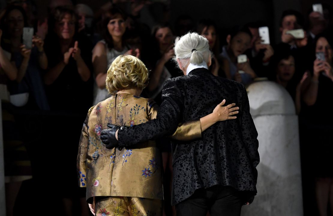 Karl Lagerfeld and Silvia Fendi acknowledge the audience at the end of the Fendi fashion show at the Trevi Fountain in Rome, in 2016.