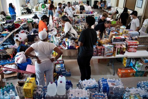 People gather donations at the Christ Episcopal Church in Miami.