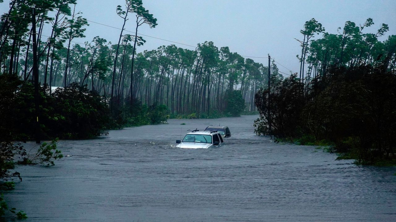 Cars sit submerged in water Tuesday in Freeport.
