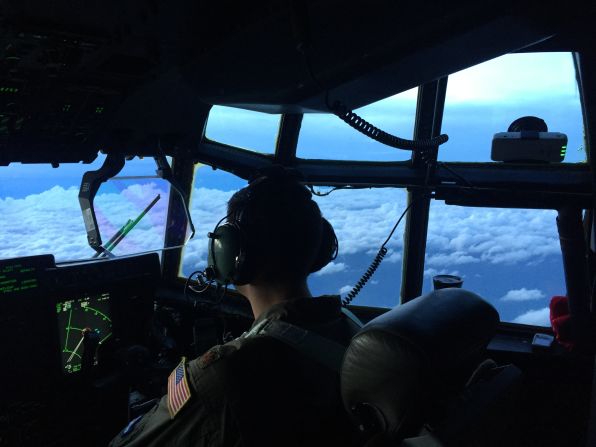 Here, a Hurricane Hunter pilot steers into Hurricane Dorian's path in 2019. Using a device called a dropsonde, the researchers can collect information including atmospheric pressure, wind speed and wind direction. 