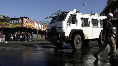 A police truck patrols an area affected by looters in Germiston, east of Johannesburg.