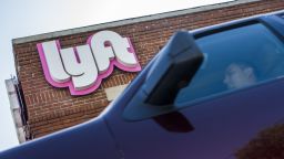 A driver rides his car in front of the Lyft drivers hub in Los Angeles, California, March 29, 2019. - Ride-hailing company Lyft made its Initial Public Offering (IPO) on the Nasdaq Stock Market on March 29th. (Photo by Apu Gomes / AFP)        (Photo credit should read APU GOMES/AFP/Getty Images)