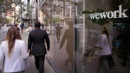 WeWork said Wednesday that it will add the first woman to its board, following criticism. 